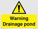 warning-drainage-pond~